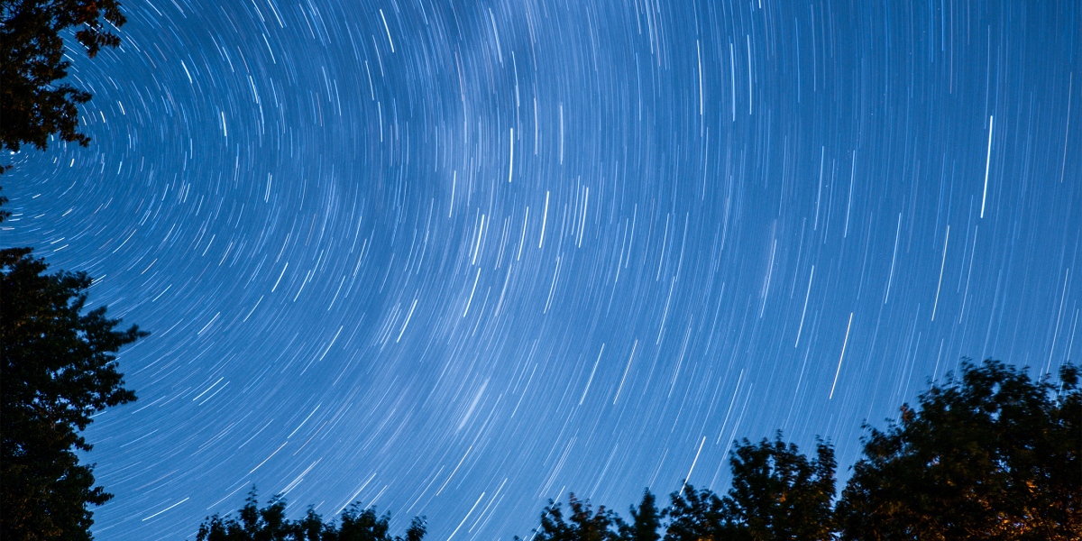 a 28 minute long exposure of the stars above the deep woods of Maine